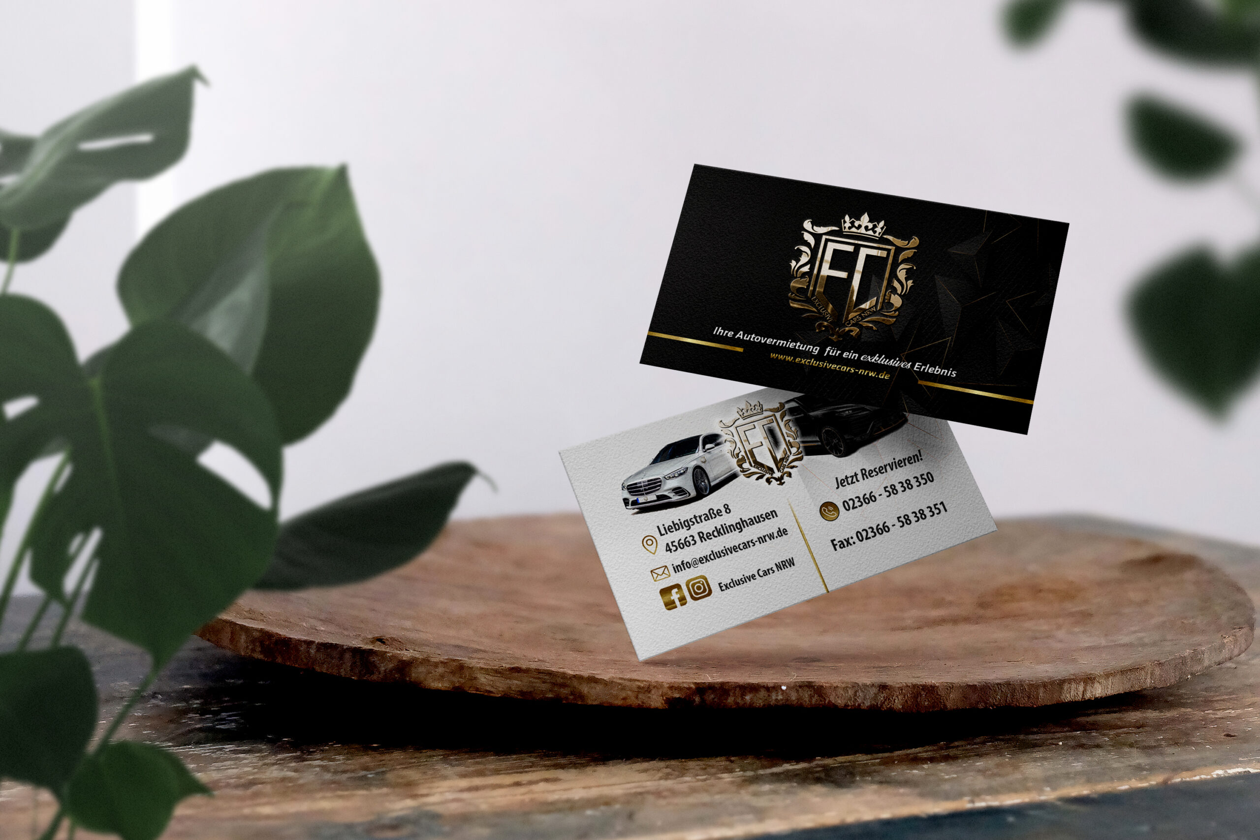 Clean minimal business card mockup on wooden plate with leaves background. PSD file.